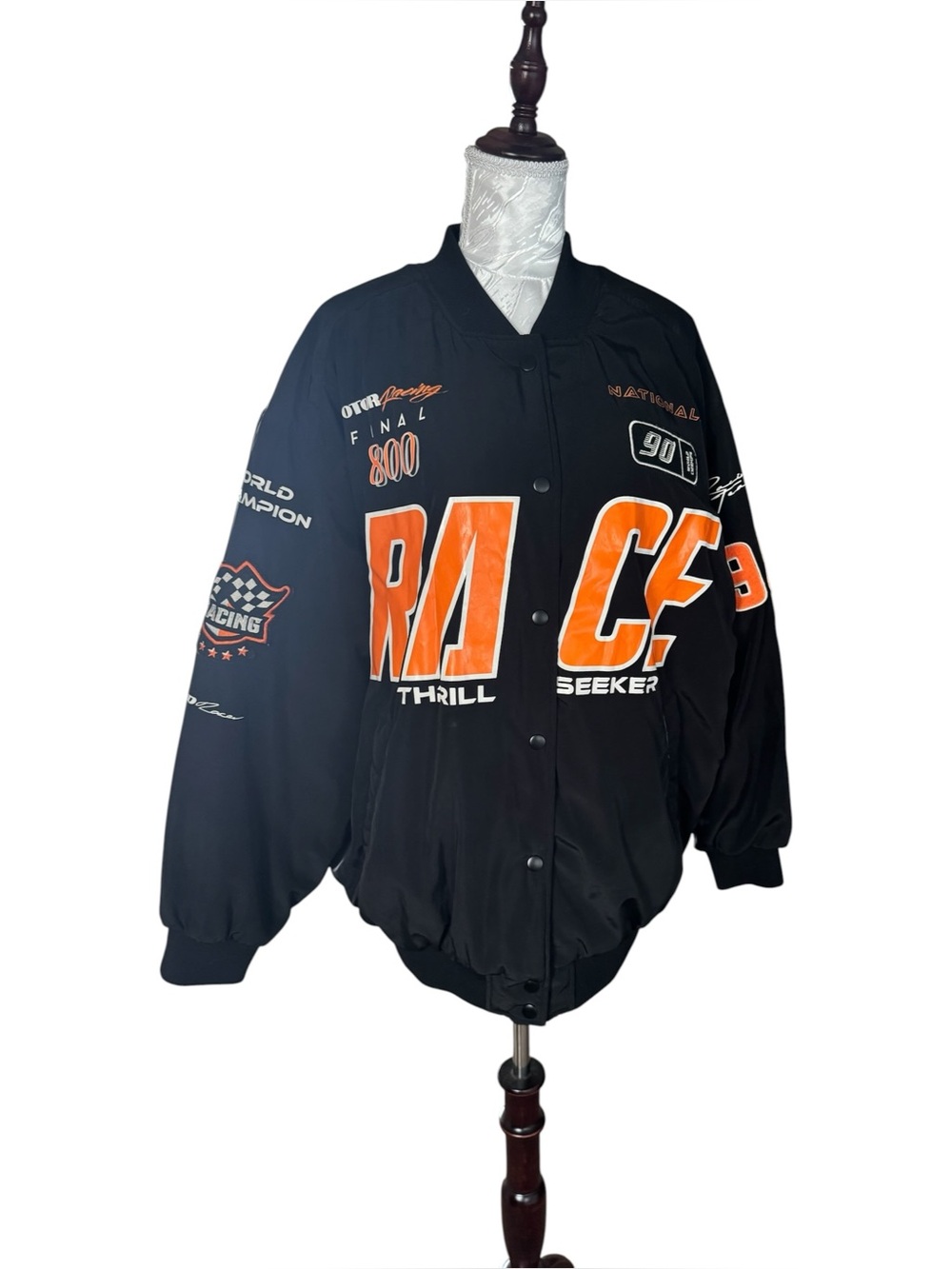 H&M Divided black and orange racing bomber jacket featuring bold "RACE"